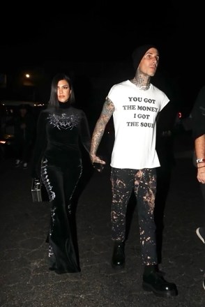 West Hollywood, CA - *EXCLUSIVE* - Sweet parents Kourtney Kardashian and Travis Barker leave son Landon Barker at his birthday concert at the Roxy in West Hollywood Pictured: Kourtney Kardashian, Travis Barker BACKGRID USA OCTOBER 16, 2022 BYLINE MUST READ: iamKevinWong.com / BACKGRID USA: +1 310 798 9111 / usasales@backgrid.com UK: +44 208 344 2007 / uksales@backgrid.com *UK Clients - Images containing children, please rasterize face before posting*